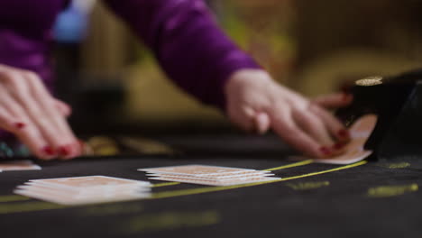 croupier dealing poker cards.