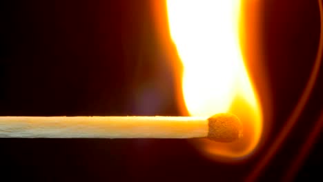 burning match and flame