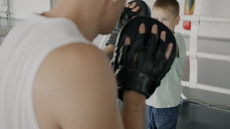 boxing training with a young boy