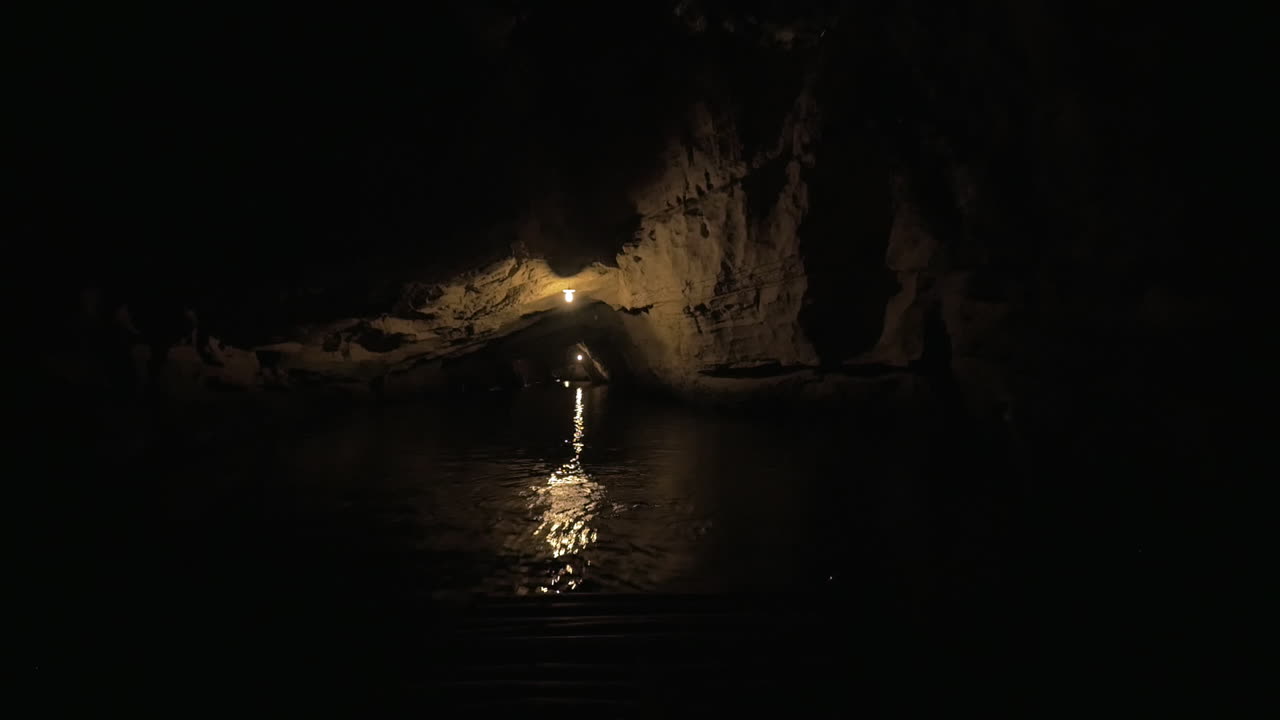 In Halong Bay in Hanoi Vietnam seen river and dark grotto