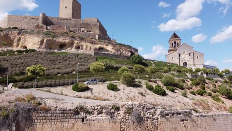 aerial image of the castle and the church of alcaudete