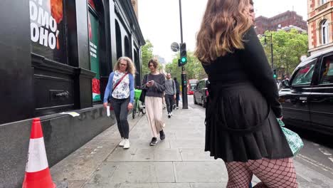 pedestrians and traffic on a london street