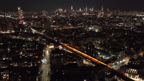 aerial view of the new york city skyline at night