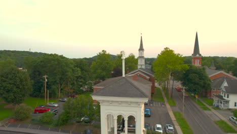 Aerial-rotate-around-a-church-cross-in-Downtown-Palmyra-in-New-York-State-USA