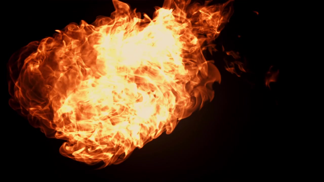 Large Fire Flame Igniting and Burning on Black Background