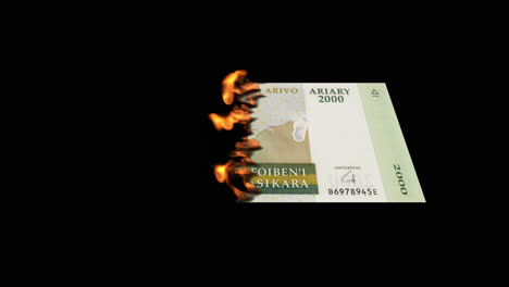 burning 2000 ariary banknote