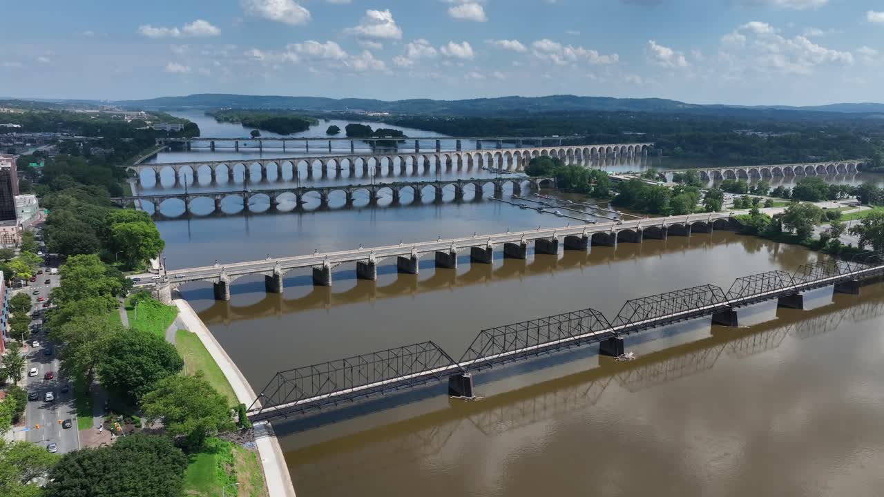 Several bridges over Susquehanna River in Harrisburg city, Pennsylvania. Aerial wide shot