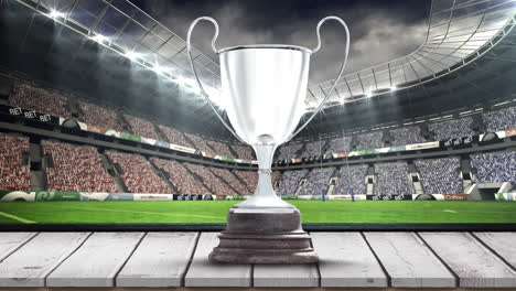 animation of silver cup in sports stadium