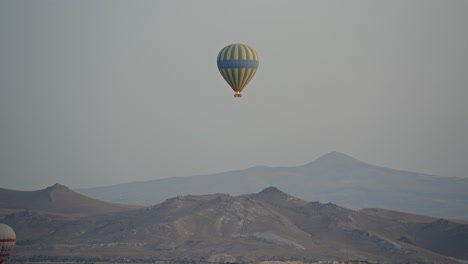 Hot-air-balloon-burner-firing-hot-air-into-envelope-to-make-it-rise,-Cappadocia