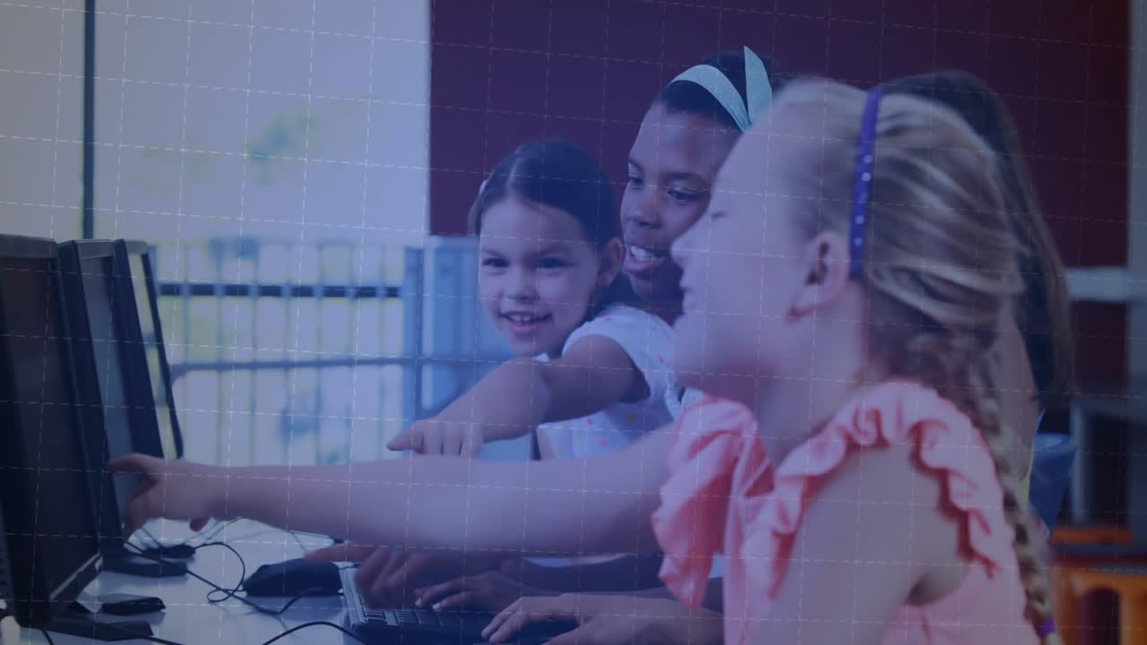 Girls collaborating in school lab, pointing at screens and activating animated bar graphs