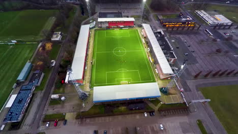 Flying-over-soccer-stadium-De-Oude-Meerdijk,-home-of-FC-Emmen