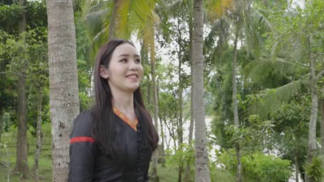 smiling woman in traditional outfit