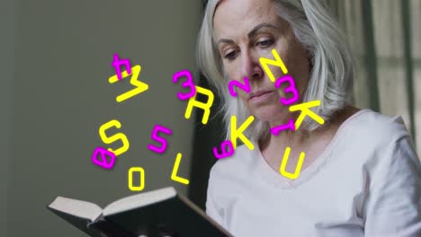 Animation-of-letters-and-numbers-changing-over-senior-woman-reading-book-in-background