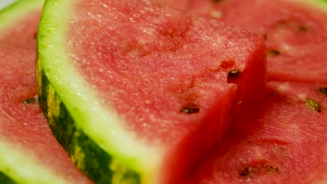 close-up slice of watermelon spinning.