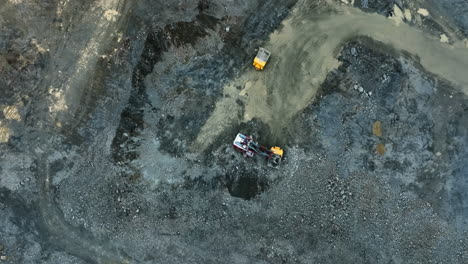 aerial view of quarry with heavy equipment