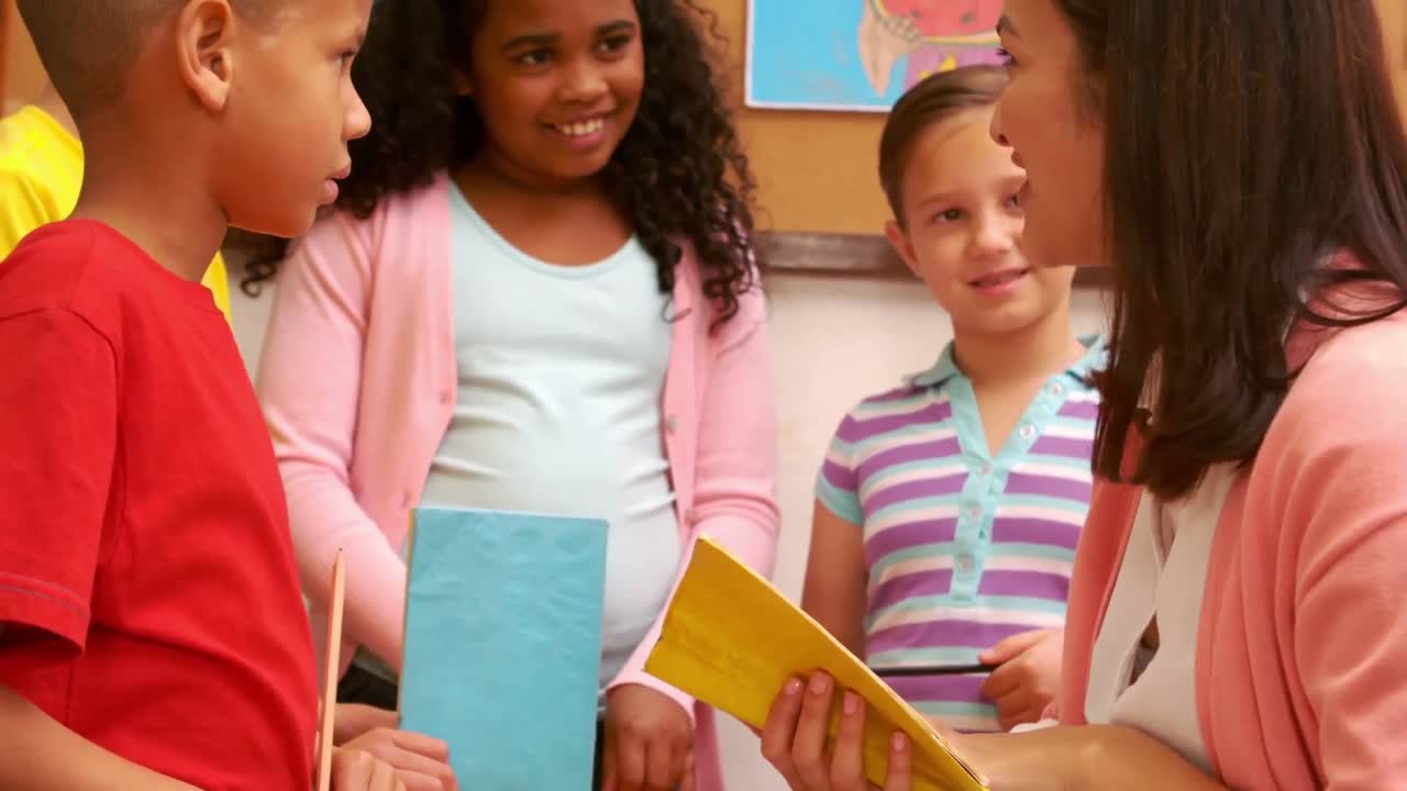 Teacher reading her pupils a story 