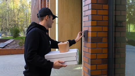 delivery man ringing on the entrance