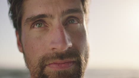 close-up-portrait-of-attractive-young-man-thinking-contemplative-looking-pensive-serious-sunny-outdoors