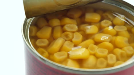 open can of canned corn