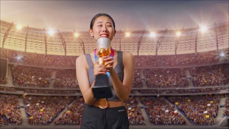 mujer celebrando la victoria en un estadio