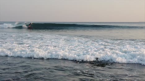 Anonymous-Surfer-on-Waves-at-Little-Andaman-Island-at-Sunset