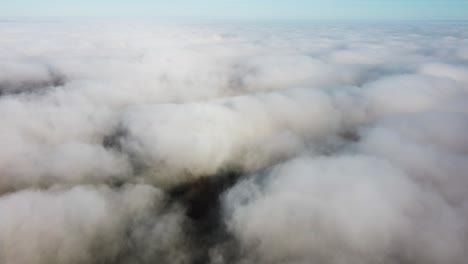 Mist-fog-clouds-from-above-aerial-view-over