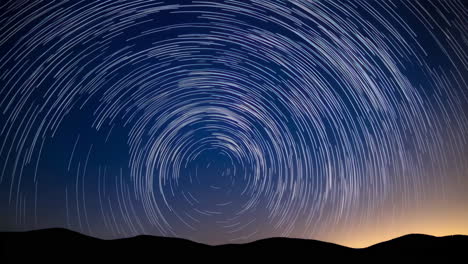 star trails over mountains