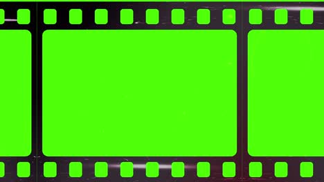 pantallas verdes con ranuras o tiras de película negativa perforadas, superficie de fuga de luz