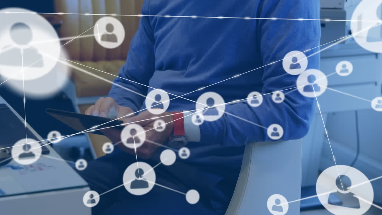 animación de una red de iconos de perfil contra la sección media de un hombre que usa una tableta digital en la oficina