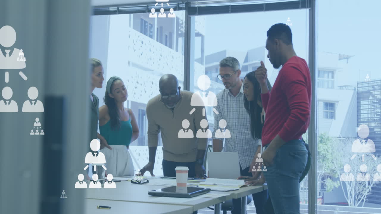 Animation of flowcharts of profile icons over diverse coworkers discussing floor plan on blueprint