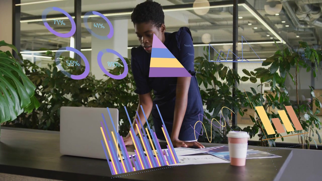 Woman leaning using laptop scanning docs causing AR charts rising above table for business audit