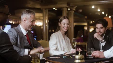 man celebrating victory in poker game.