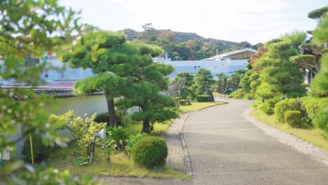 japanese garden in toba bay, mikimoto pearl island on warm day