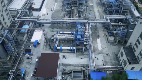 aerial view of oil depot, an oil refinery, truck transporting fuel and gasoline, gas storage terminal. petrochemical refinery plant