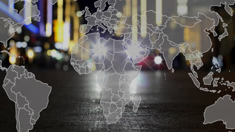 world map animation over city street with blurred lights and cars