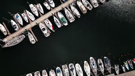 many small boats in the harbor, top shot, baltic sea, warnemünde, drone