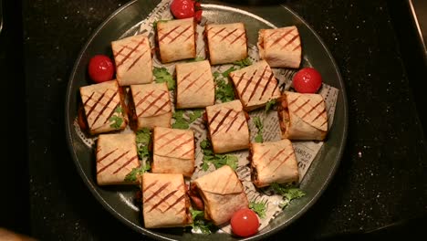 chicken and meat shawarma pieces wrapped in grilled tortilla bread