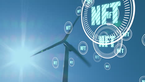 animation of falling nft icons over windmill