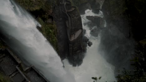 revealing view of devil's cauldron waterfall in rio verde near baã±os de agua santa, ecuador