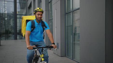 delivery person on bike in city