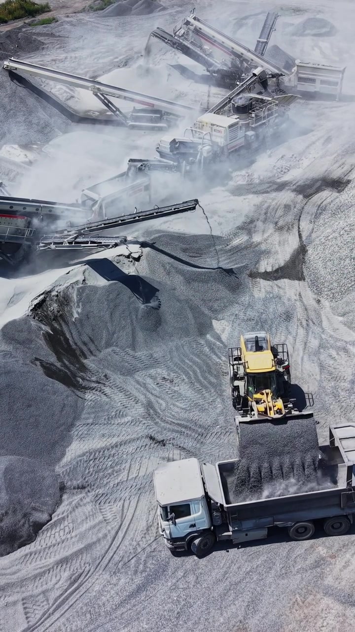 Construction site with machinery working on gravel extraction