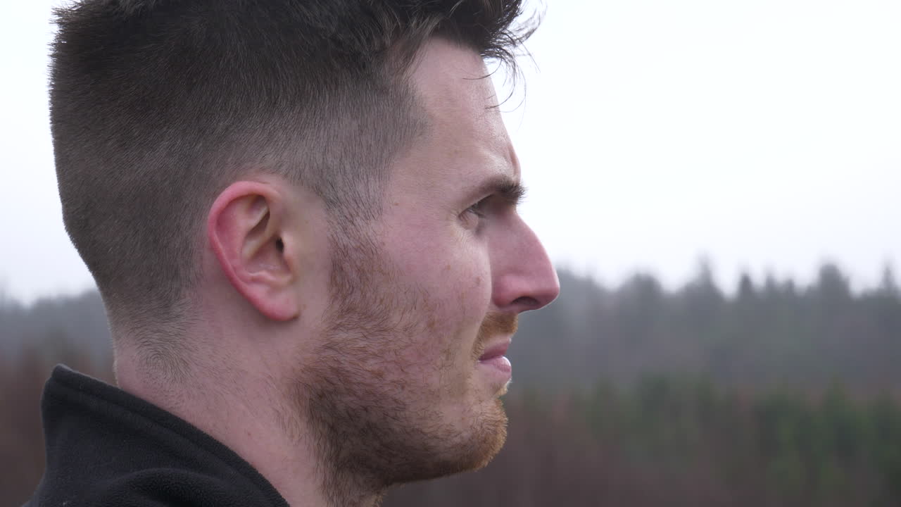 Close Up Portrait of An Active Man Overlooking Nature Landscape In Wales