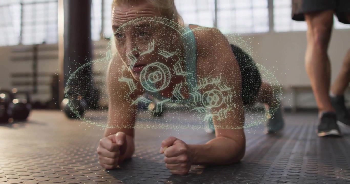 Woman holding forearm plank while hologram materializing gears rotating monitoring fitness metrics