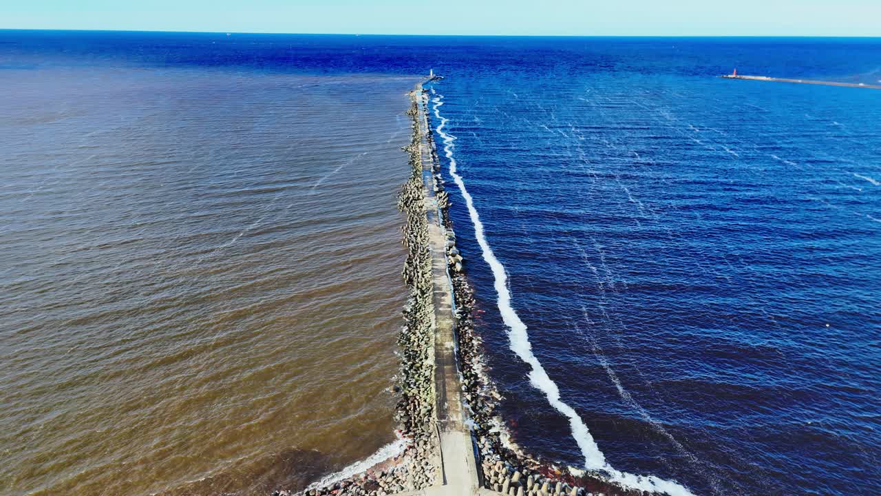 Aerial perspective of Mangalsala, coastal area where Daugava River meets Baltic Sea in Riga, Latvia