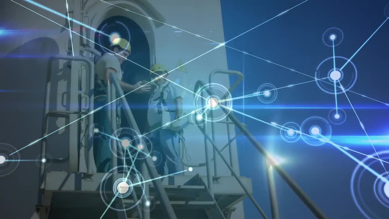 animación de la red de conexiones sobre la turbina eólica y ingenieros masculinos en el fondo