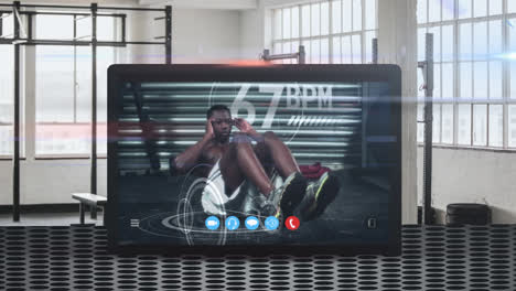 Animation-of-tablet-computer-showing-a-African-American-man-exercising.-Coronavirus--spreading