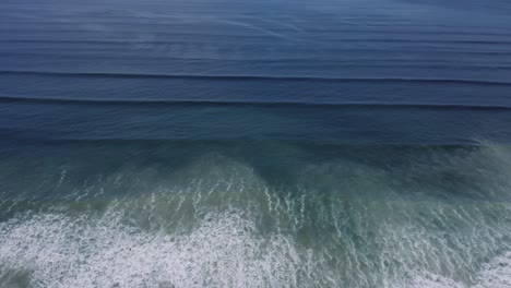 aerial view ocean swell, tracking forward 4k
