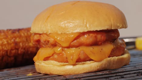 veggie orange burger on grill, carrot and oats burger with corn and yellow pepper, vegetarian food barbeque, potato grill burger.