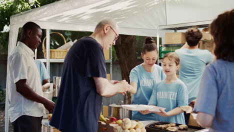 young girl helps needy with free meals