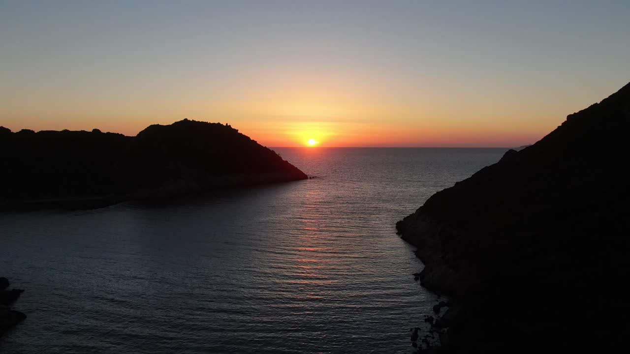 Aerial  drone view of sunset in porto timoni beach in corfu island Greece